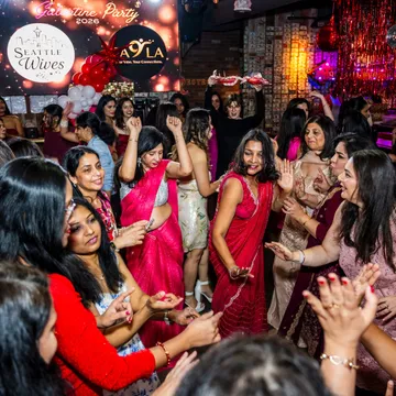 Seattle Wives members dancing at Galentine Party 2026, Feb 22 2026